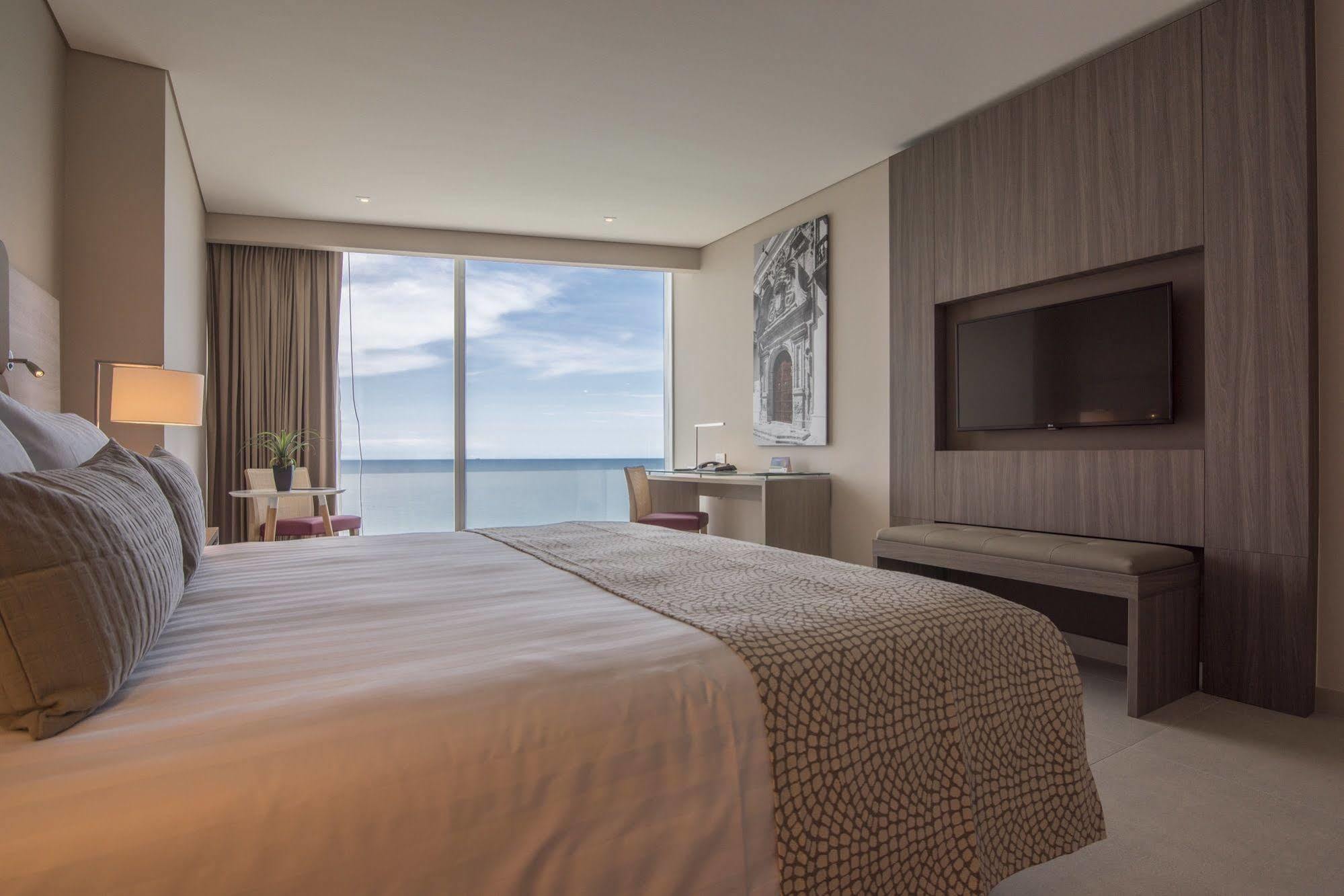 Estelar Cartagena De Indias Hotel Y Centro De Convenciones Exteriér fotografie A bedroom at the hotel